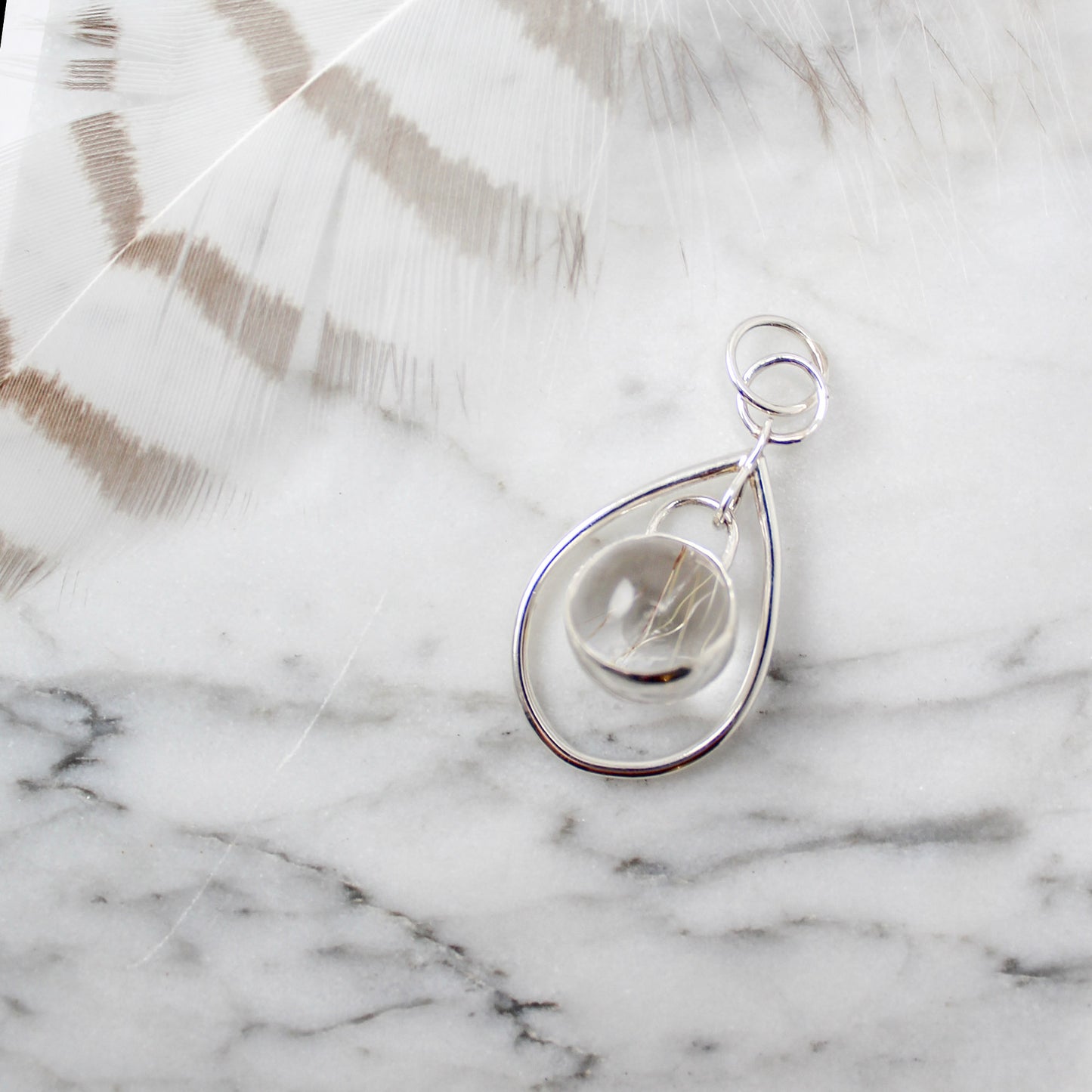 ‘Dew Drop’ Pendant in Sterling Silver with Rutilated Quartz Sphere