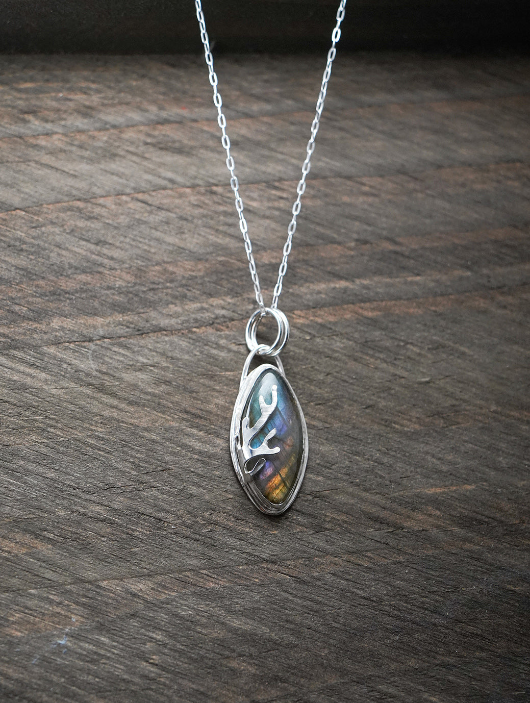 
                  
                    Navette Labradorite Decorative Coral Inspired Sterling Silver Pendant - lt. rainbow cutout back
                  
                