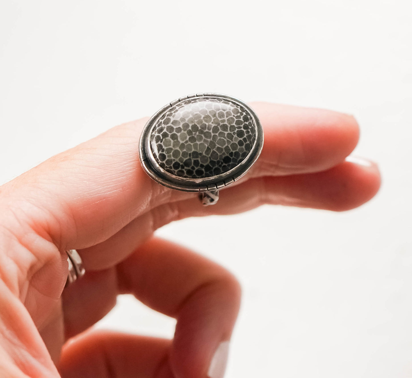 
                  
                    Fossilized Coral Oval Sterling Silver Patina Ring - Size 7
                  
                