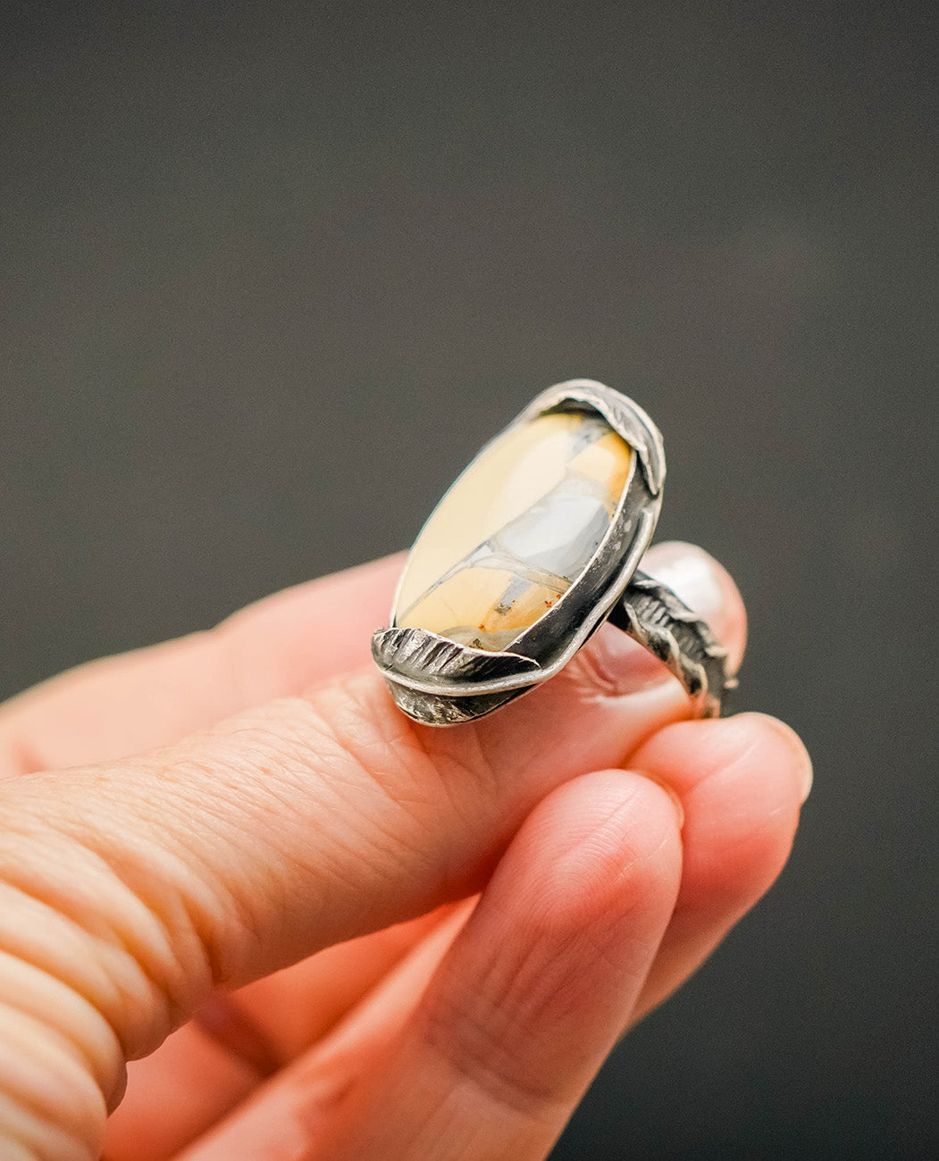 
                  
                    Maligano Jasper Oval Feather Ring with Patina– Size 7.5
                  
                