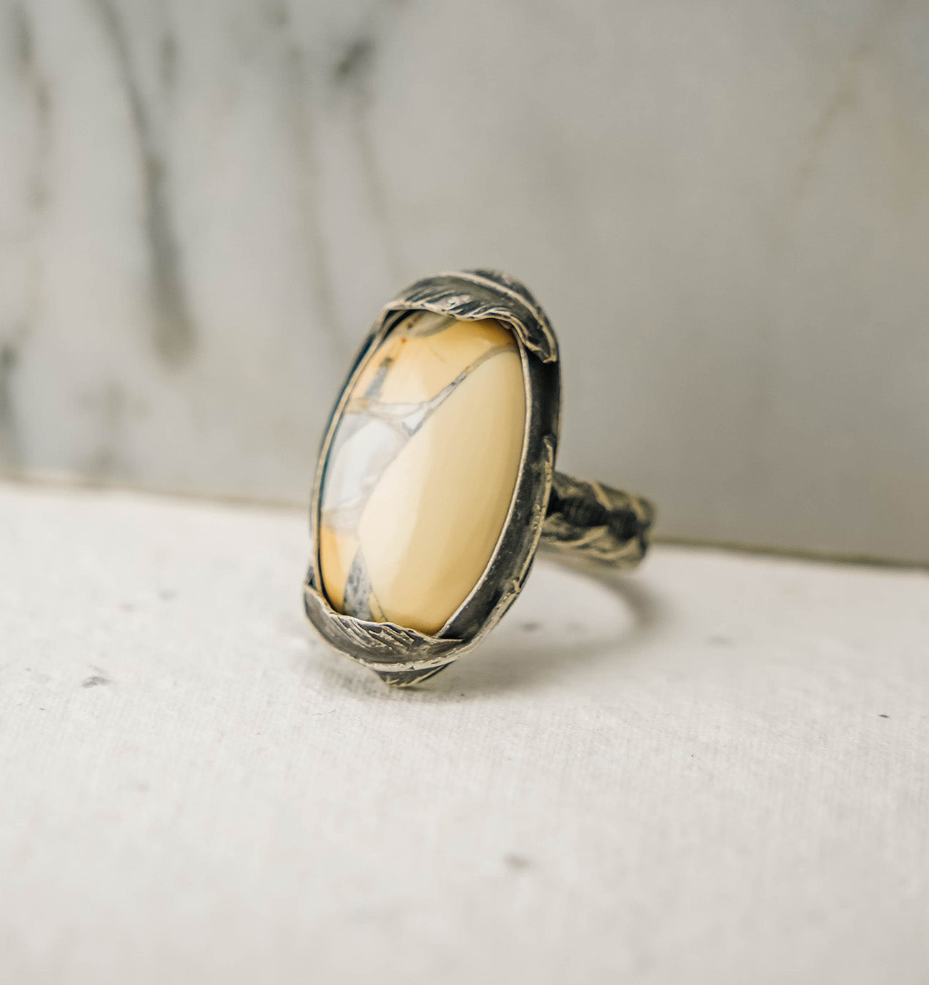 
                  
                    Maligano Jasper Oval Feather Ring with Patina– Size 7.5
                  
                